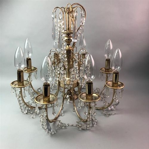 Lot 115 - A CUT GLASS AND GILT METAL CHANDELIER