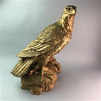 Lot 232 - A FIGURE OF AN EAGLE AND A MODEL HORSE HEAD