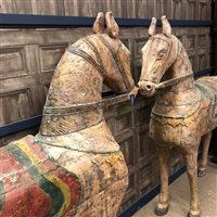 Lot 1018 - TWO WOODEN HORSES