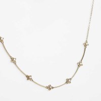 Lot 175 - DIAMOND NECKLACE with seven floral design...