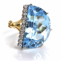 Lot 177 - IMPRESSIVE TOPAZ AND DIAMOND RING set with a...