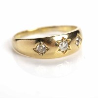 Lot 178 - VICTORIAN THREE STONE DIAMOND RING star set...