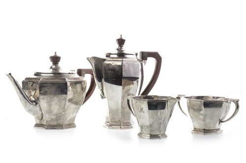 Lot 823 - A GEORGE V SILVER FOUR PIECE TEA SERVICE AND A SILVER PLATED TRAY