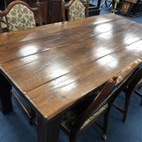 Lot 134 - AN OAK REFECTORY STYLE DINING TABLE