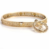 Lot 197 - VICTORIAN STYLE GOLD BANGLE with pierced...