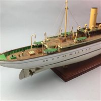 Lot 165 - A PAINTED MODEL BOAT OF THE KARIELA