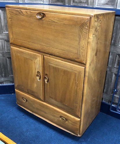Lot 253 - AN ERCOL DRINKS CABINET
