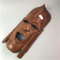 Lot 187 - AN AFRICAN PAINTED WOOD WALL MASK