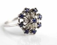 Lot 217 - SAPPHIRE AND DIAMOND CLUSTER RING set...