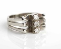 Lot 218 - DIAMOND THREE STONE RING set with three...