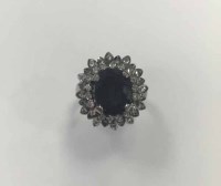 Lot 231 - SAPPHIRE AND DIAMOND CLUSTER RING of floral...
