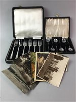 Lot 116 - A LOT OF EIGHT CASED SETS OF SILVER PLATED FLATWARE AND POSTCARDS