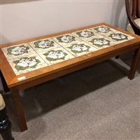 Lot 205 - A TEAK TILE TOPPED COFFEE TABLE
