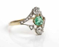 Lot 245 - EMERALD AND DIAMOND DRESS RING the central...