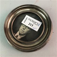 Lot 213 - A SILVER CIRCULAR PHOTOGRAPH FRAME WITH SILVER VANITY MIRRORS AND BRUSHES