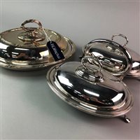 Lot 215 - TWO SILVER PLATED SERVING DISHES AND THREE PLATED TOAST RACKS