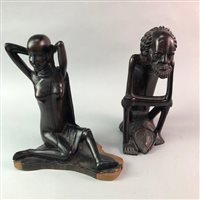 Lot 262 - A GROUP OF AFRICAN NATIVE CARVINGS AND A STOOL