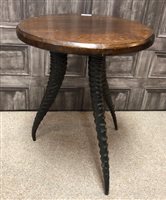 Lot 261 - AN OCCASIONAL TABLE WITH ANIMAL HORN LEGS