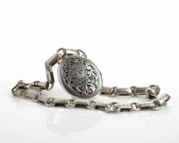 Lot 257 - VICTORIAN SILVER LOCKET engraved with foliate...