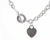 Lot 259 - TIFFANY AND CO SILVER NECKLACE with T-Bar and...