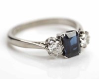 Lot 260 - SAPPHIRE AND DIAMOND THREE STONE RING the...