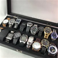 Lot 91 - A LOT OF EIGHTEEN GENTS WRIST WATCHES IN DISPLAY CASE
