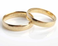 Lot 261 - TWO EIGHTEEN CARAT GOLD WEDDING BANDS both...