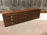 Lot 871 - A NEST OF SMALL DRAWERS