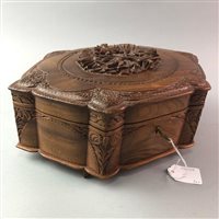 Lot 2 - AN ANGLO-INDIAN CARVED TEAK SEWING BOX AND A CARVED WOOD BOX
