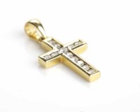 Lot 269 - DIAMOND CROSS PENDANT channel set with twelve...