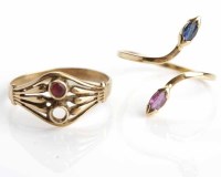 Lot 274 - RUBY AND SAPPHIRE SERPENT MOTIF RING with two...