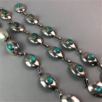 Lot 170 - A TURQUOISE MOUNTED SILVER BELT