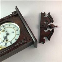 Lot 176 - A 31 DAY WALL CLOCK