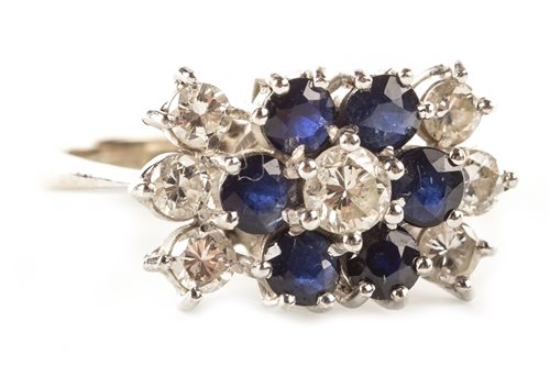Lot 107 - A BLUE GEM AND DIAMOND CLUSTER RING
