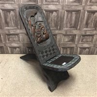 Lot 306 - A CARVED WOODEN CHAIR