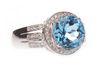 Lot 128 - A TOPAZ AND DIAMOND RING