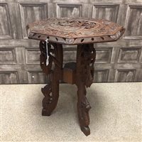 Lot 319 - AN INDIAN CARVED TEAK OCTAGONAL TABLE