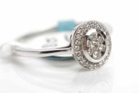 Lot 307 - DIAMOND DRESS RING the oval bezel set with...