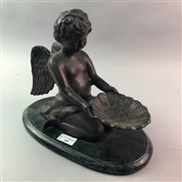 Lot 338 - A SPELTER FIGURE OF A CHERUB