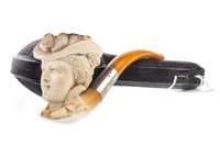 Lot 901 - A CARVED MEERSCHAUM SILVER MOUNTED PIPE