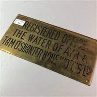 Lot 361 - A BRASS PLAQUE