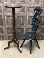 Lot 349 - A MAHOGANY TORCHERE WITH AN EBONISED SPINNING CHAIR