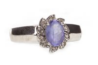 Lot 222 - A PURPLE GEM AND DIAMOND CLUSTER RING