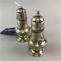 Lot 444 - A PAIR OF SILVER PEPPER POTS