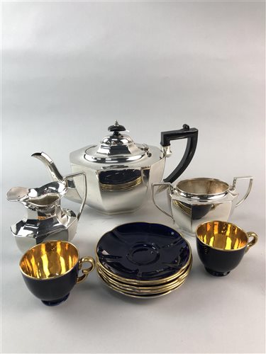 Lot 51 - A THREE PIECE SILVER PLATED TEA SERVICE WITH A CROWN DEVON PART COFFEE SERVICE
