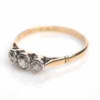 Lot 360 - DIAMOND THREE STONE RING set with three old...