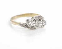 Lot 365 - EARLY TWENTIETH CENTURY DIAMOND THREE STONE...