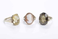 Lot 368 - THREE LATER TWENTIETH CENTURY DRESS RINGS one...