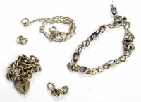 Lot 370 - THREE NINE CARAT GOLD BRACELETS one set with...