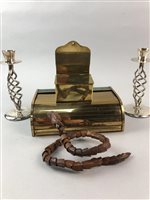 Lot 71 - AN ART DECO CASKET, A BRASS BOX, A MODEL SNAKE AND PAIR OF CANDLESTICKS